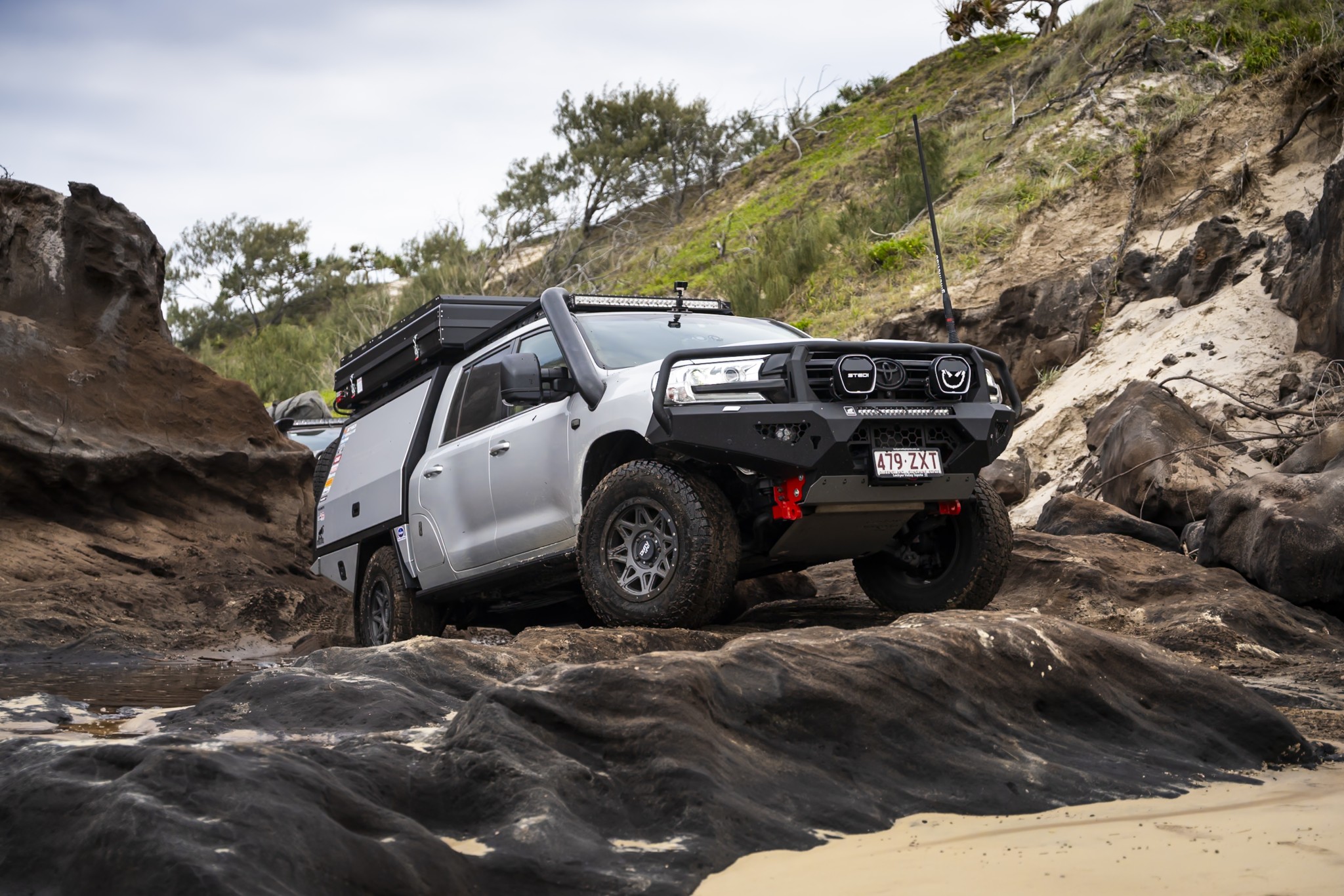 Murray’s GU Patrol in Trig Point workshop during custom Trig 48 tourer build and 4WD modifications